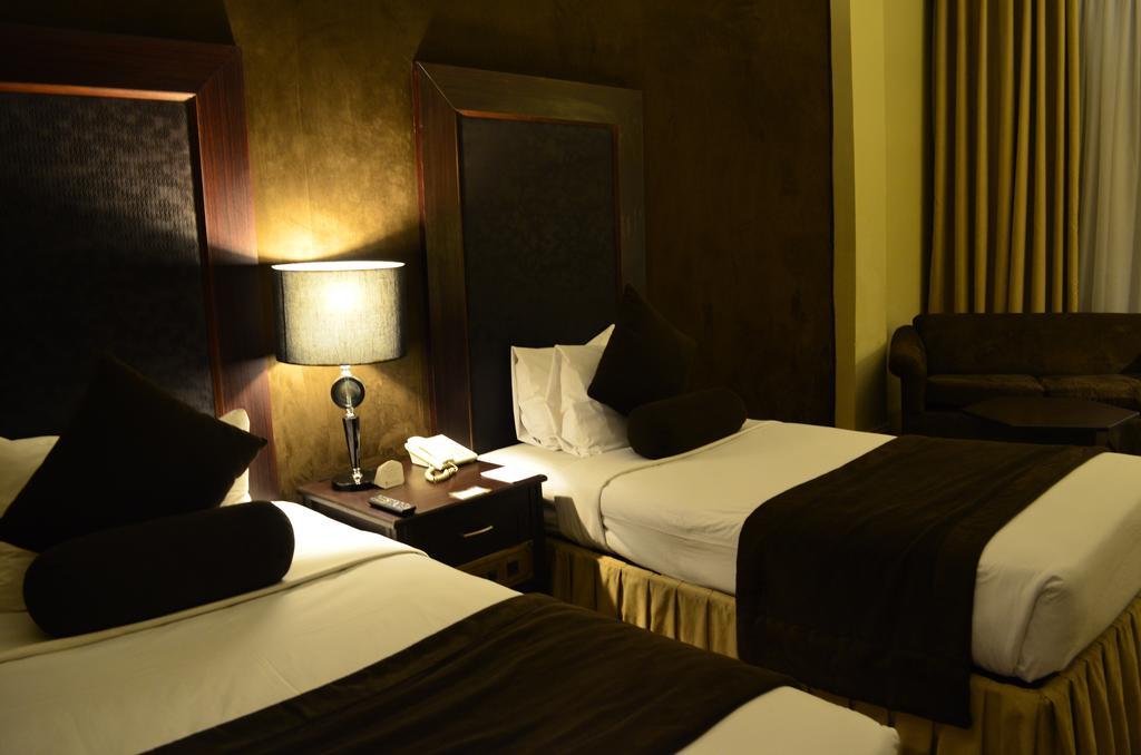 Smart Hotel Lahore Quarto foto