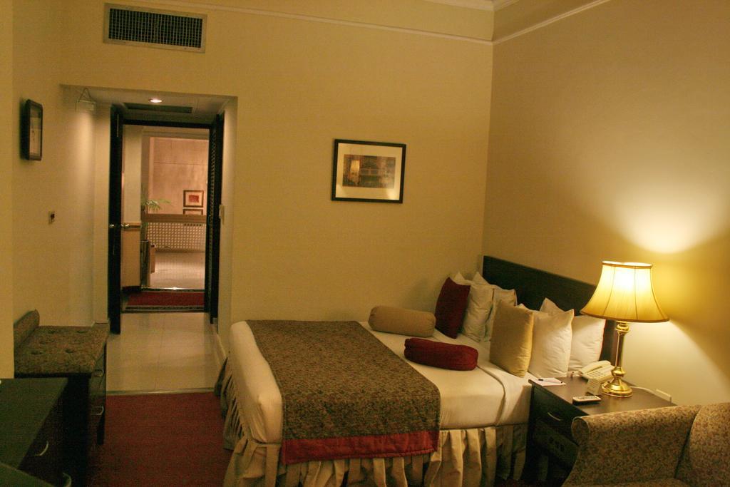 Smart Hotel Lahore Quarto foto