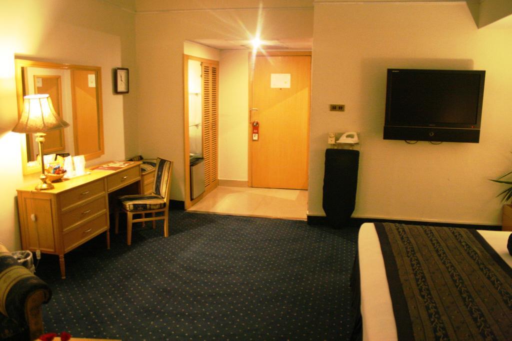 Smart Hotel Lahore Quarto foto
